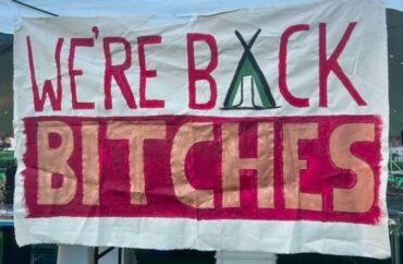 Banner reading "WE'RE BACK BITCHES"